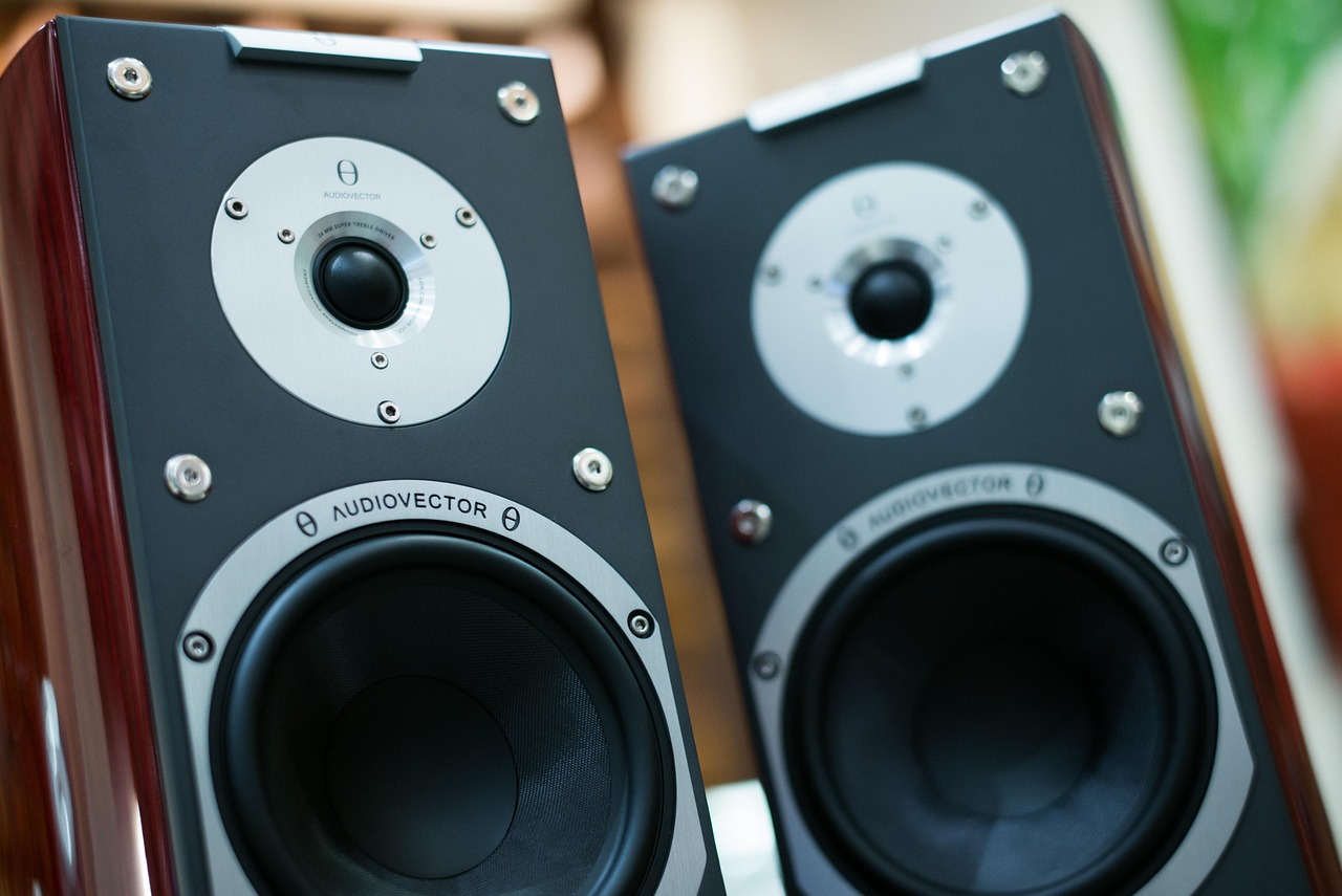 Studio monitor or bookshelf audio speakers in room
